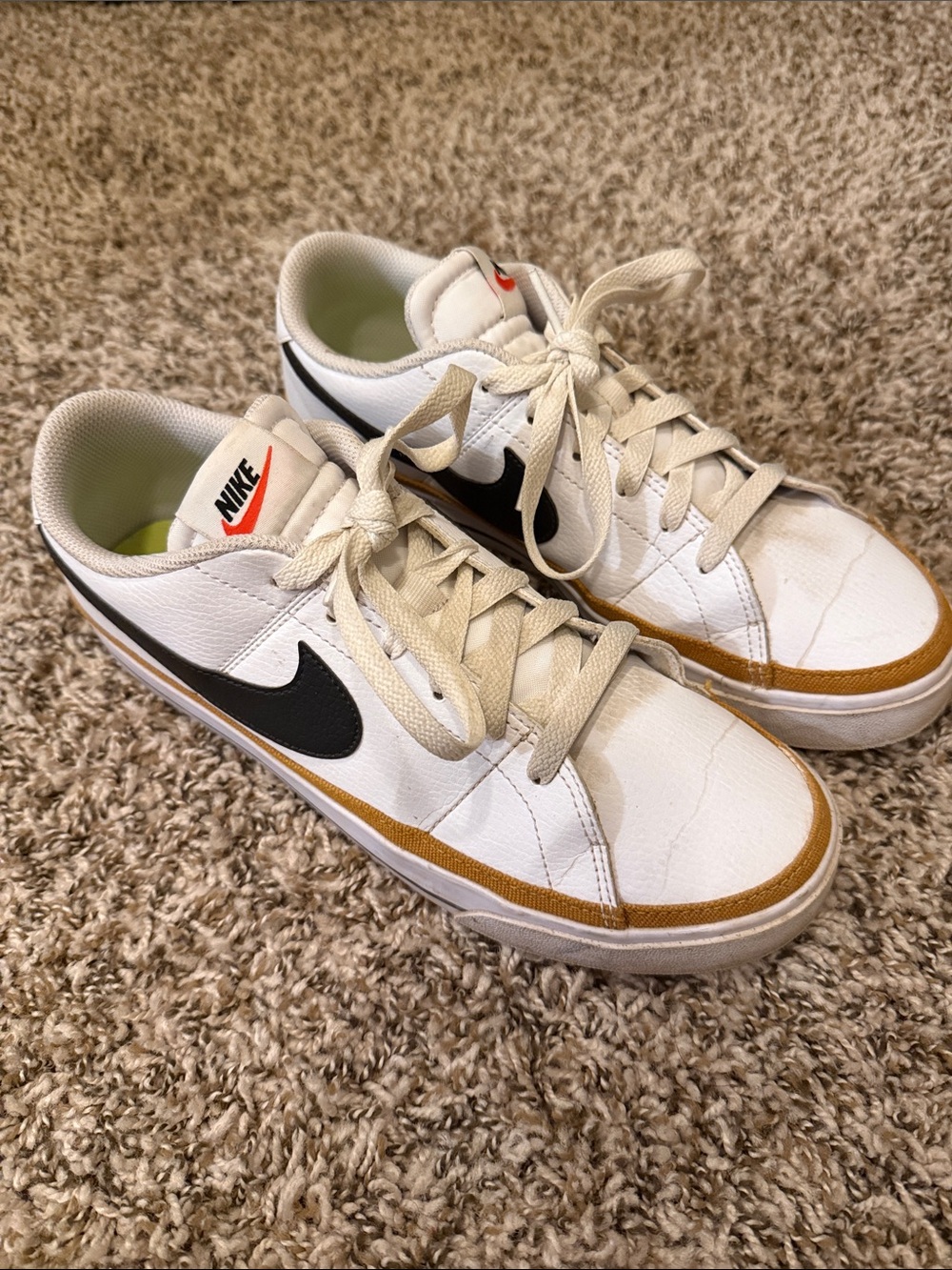Nike White Sneakers with Black Swoosh and Tan Trim
